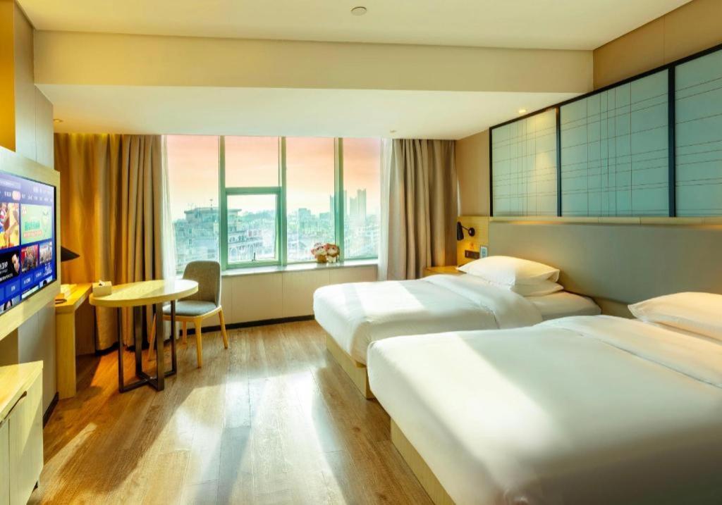 Echarm Hotel Yangjiang Baili Plaza Exteriör bild