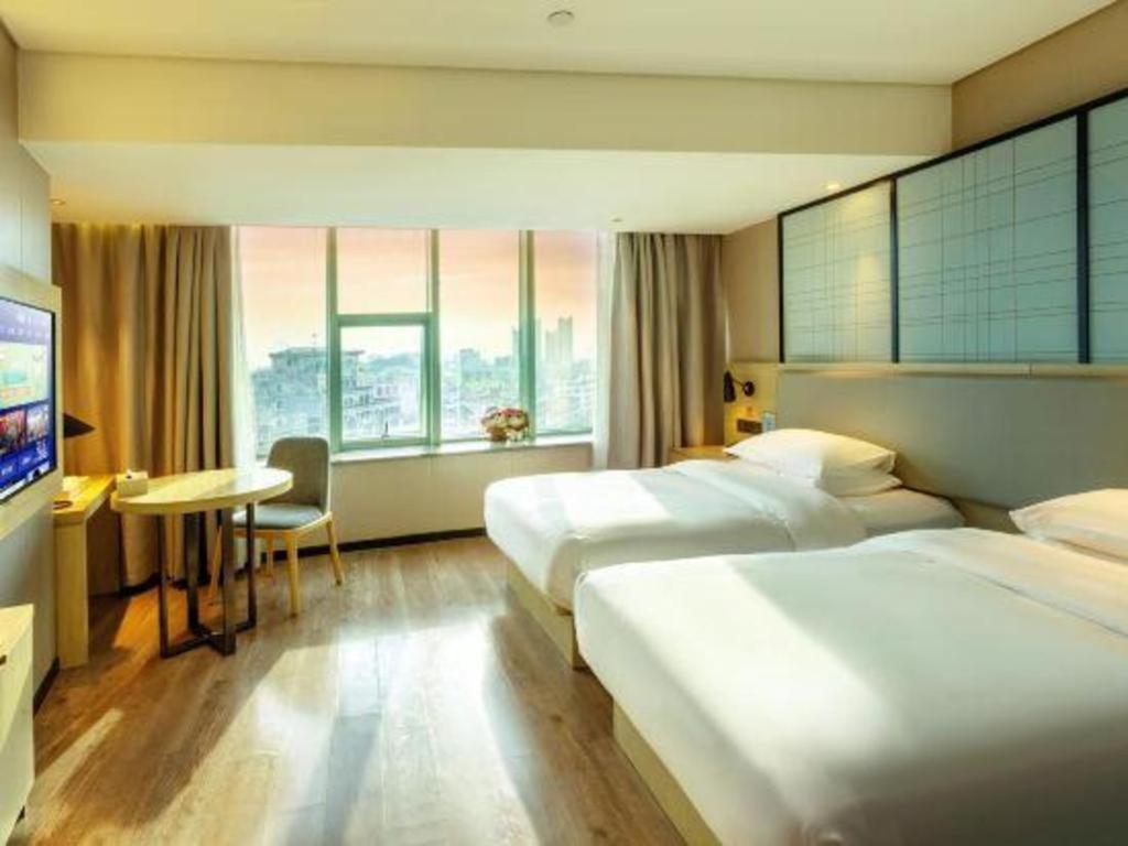 Echarm Hotel Yangjiang Baili Plaza Exteriör bild