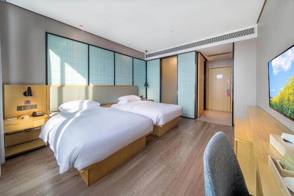 Echarm Hotel Yangjiang Baili Plaza Exteriör bild