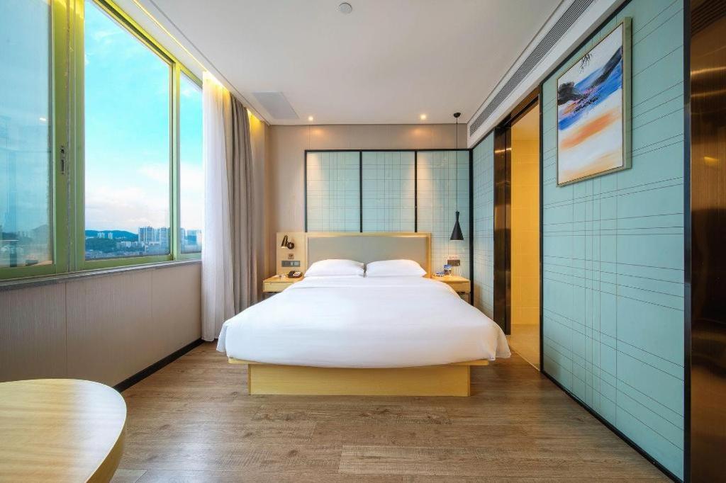 Echarm Hotel Yangjiang Baili Plaza Exteriör bild